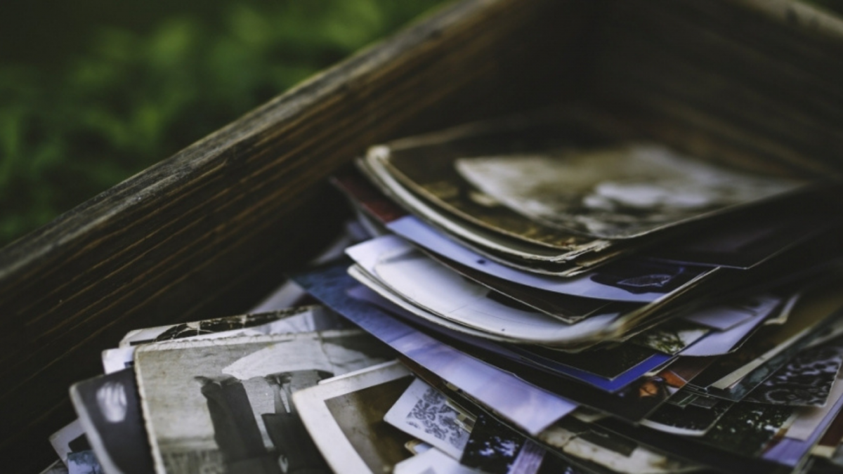 Close up on a box of old photographs