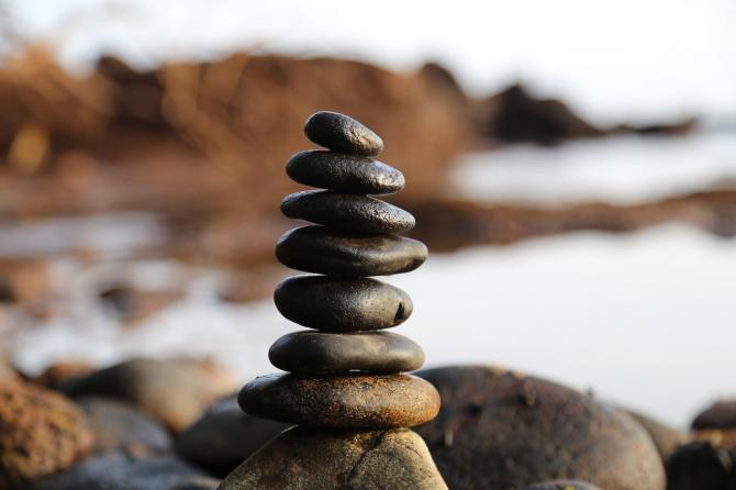 Stack of seven smooth river rocks