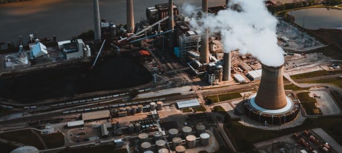 overhead view of power plant with reaction vessel emitting steam