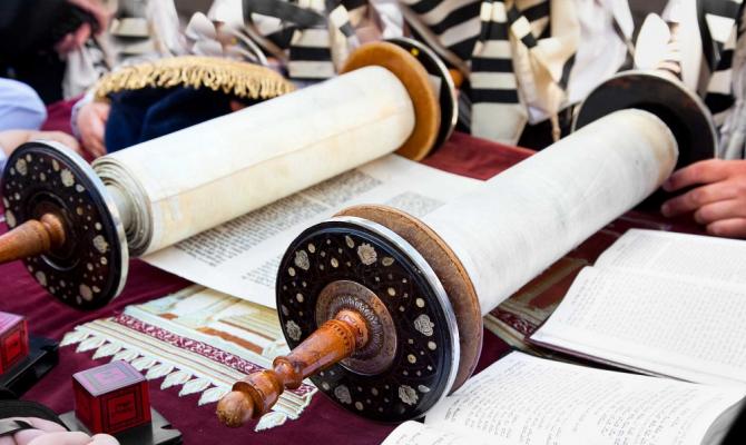 open Torah scroll being read from