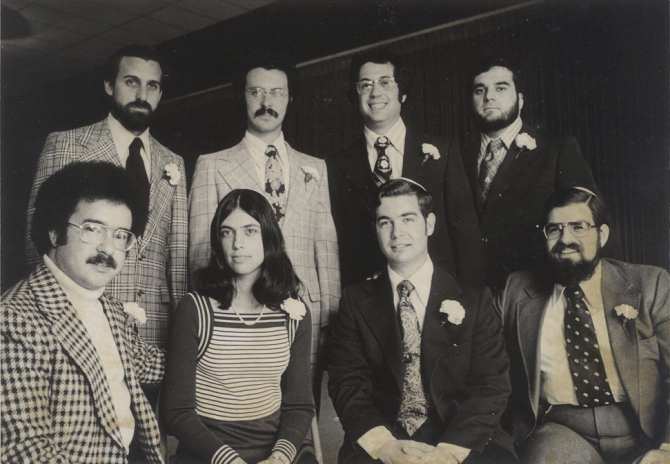 Graduating rabbis, class of 1974. Back row, from left to right: David Brusin, Saul Perlmutter, Kenneth Berger and Moshe Birnbaum. Front row, from left to right: Steven Stroiman, Sandy Eisenberg Sasso, Dennis C. Sasso and Aaron Peller. 