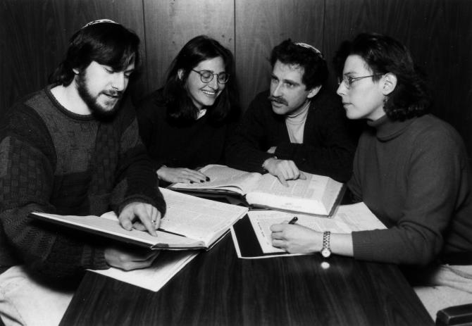 RRC students discussing the Talmud, 1995. From left to right: Rabbi Jamie Arnold, RRC '99; Rabbi Jodie Siff, RRC '01; Rabbi Jeremy Schwartz, RRC '97 and Rabbi Myriam Klotz, RRC '99. Photographer: Scott D. Weiner.