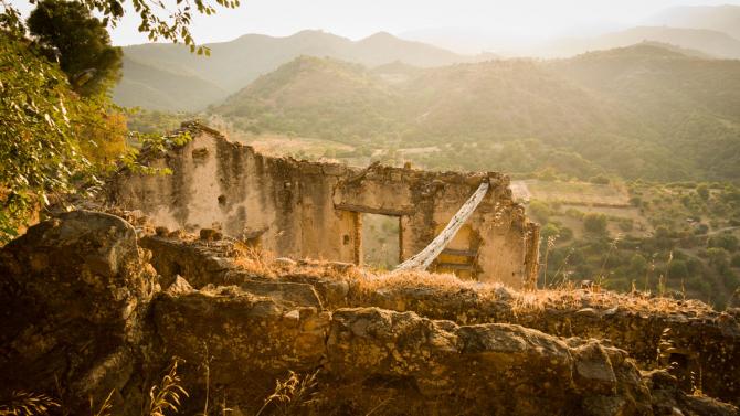 building ruins in mountainous setting