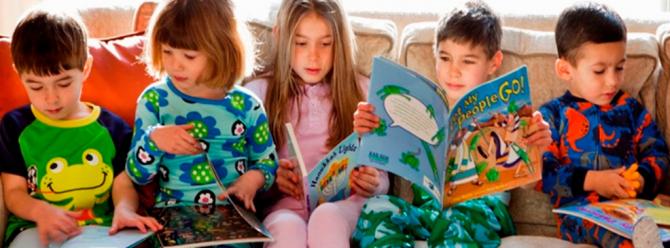 Five small boys and childs reading Jewish books