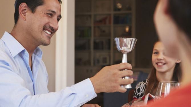 man toasting with chalice