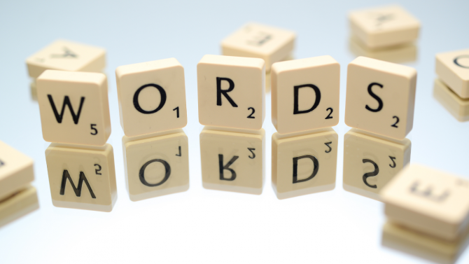 Scrabble pieces spelling out the word WORDS