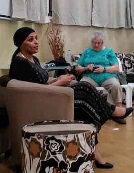 Women in headscarf speaking to group in Israel