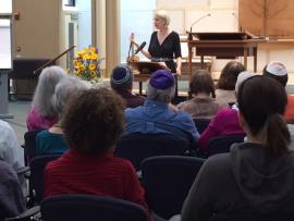Rabbi Nancy Fuchs Kreimer at lectern