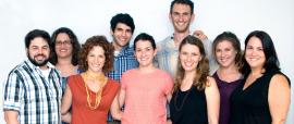9 Hebrew tutors in smiling group photo