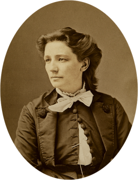 Victoria Claflin Woodhull looking towards the left in front of a plain background