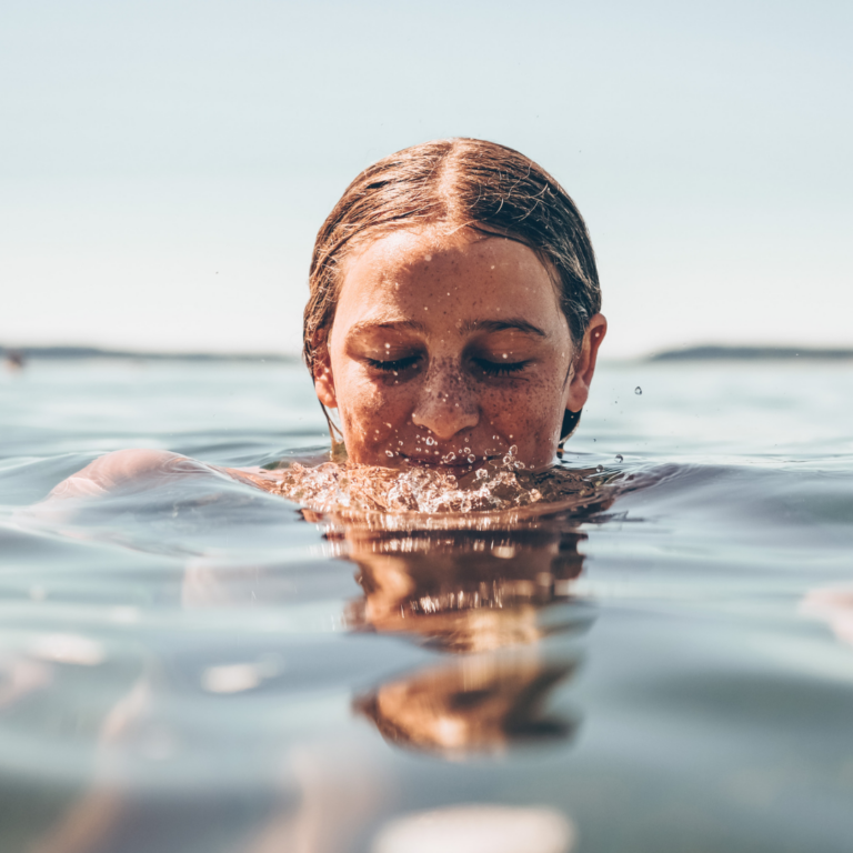 woman swimming in open water