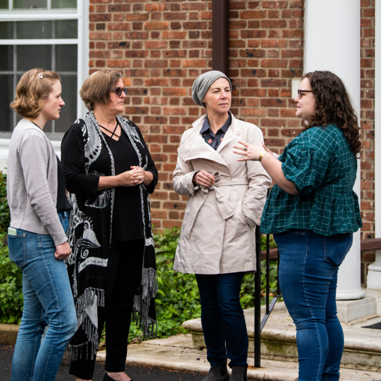 Students and faculty connect outside the Reconstructionist Rabbinical College building.