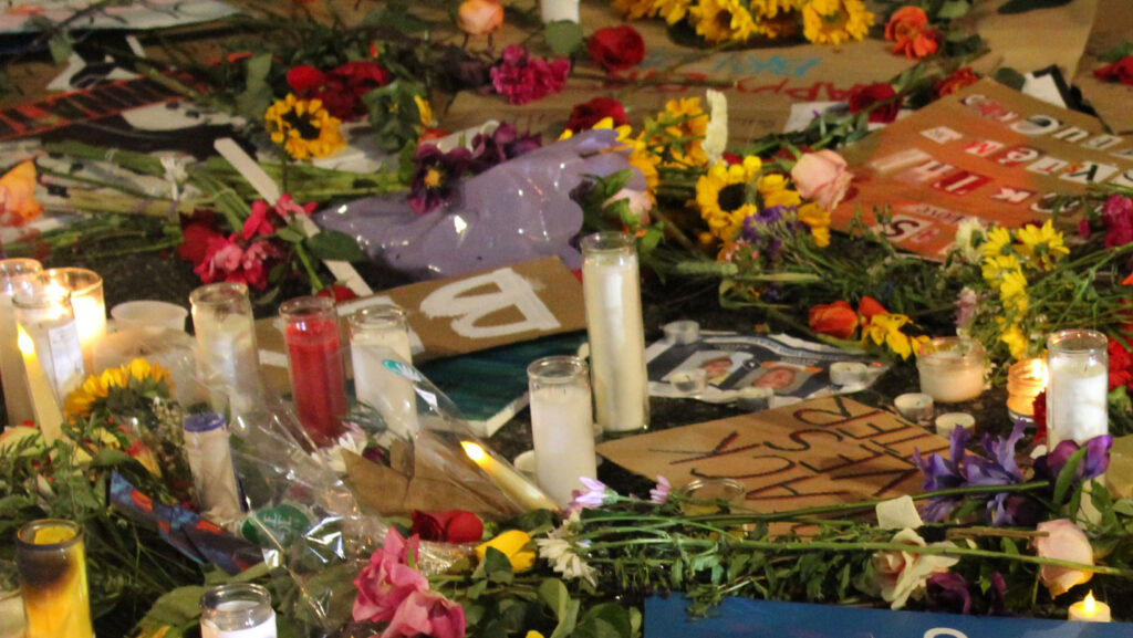 memorial for Buffalo shooting victims with flowers and candles