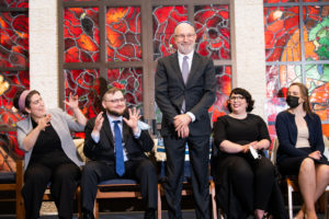 Rabbi David N. Goodman receives a round of applause from classmates at the Reconstructionist Rabbinical College’s May 22 graduation ceremony at Congregation Beth Or in Ambler. (Photo by Jordan Cassway)