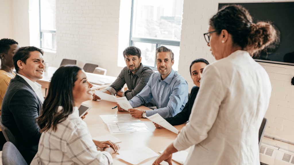 A multicultural group of people in a conference room