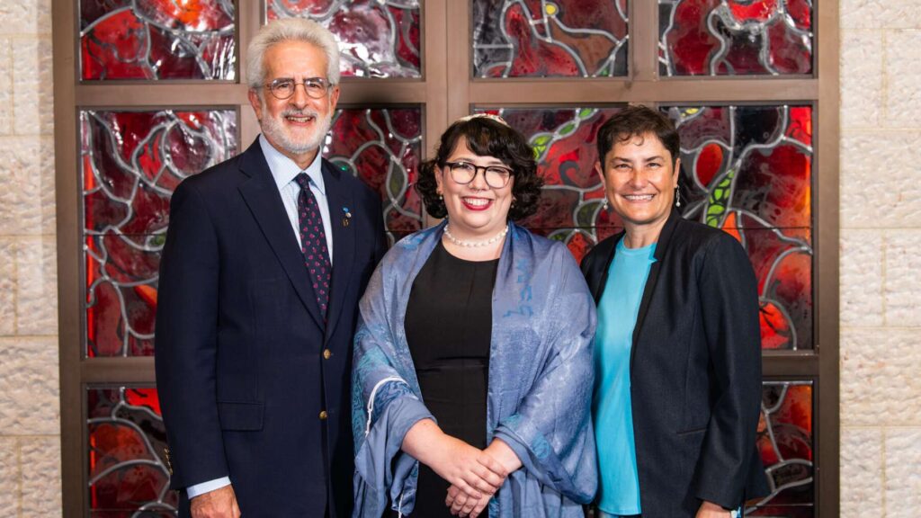 Seth Rosen, chair of Reconstructing Judaism's Board of Governors, stands next to Rabbi Alanna "Lonnie" Kleinman and Rabbi Deborah Waxman, Ph.D. president and CEO of Reconstructing Judaism.