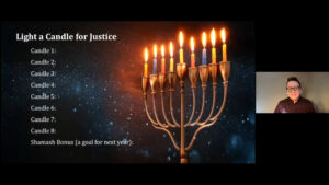 A menorah with lit candles against a starry background; text reads Light a Candle for Justice.