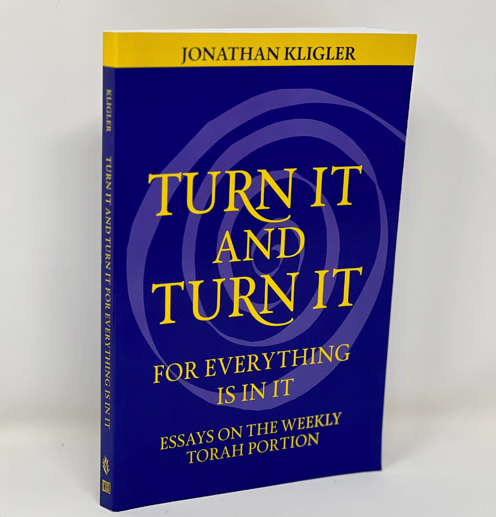 Blue book cover titled Turn It and Turn It with yellow text and author name Jonathan Kligler.