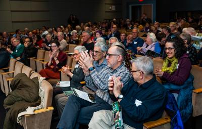 People applauding in theater