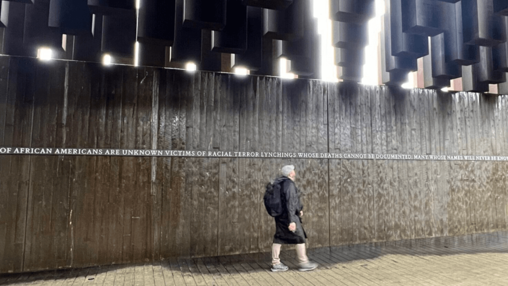 Visitor at a memorial for victims of lynching