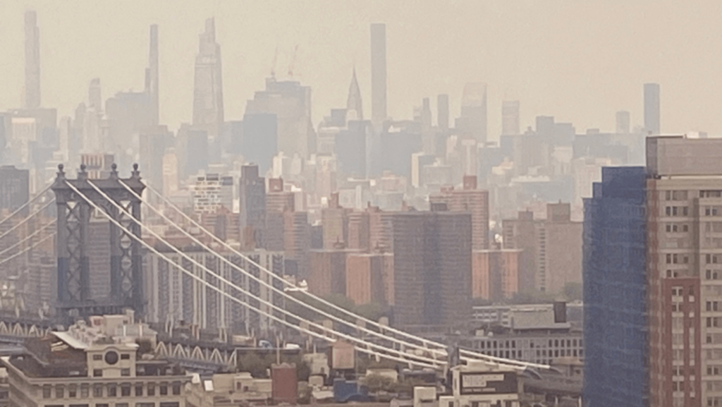 Manhattan skyline obscured by smoke.