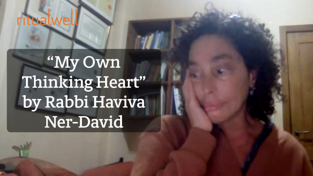Person sitting in a room with bookshelves, hand on face, text overlay: My Own Thinking Heart by Rabbi Haviva Ner-David.