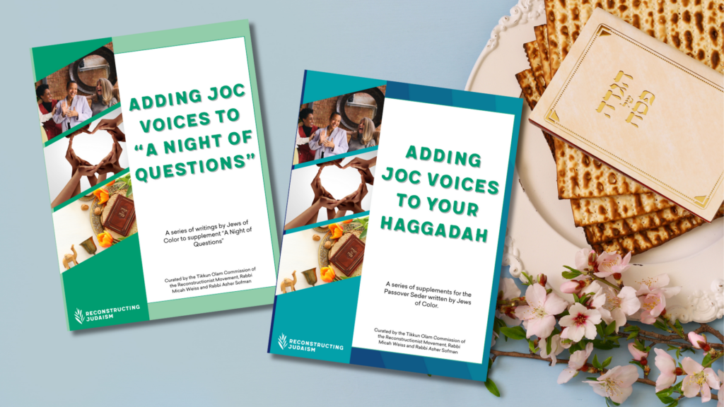 Two booklets titled Adding JOC Voices beside matzo and flowers on a wooden table.