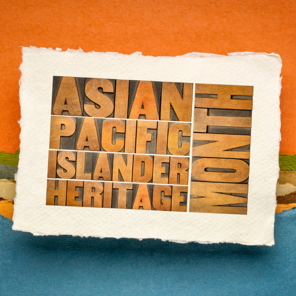 Text saying Asian Pacific Islander Heritage Month on textured paper, with a colorful background.