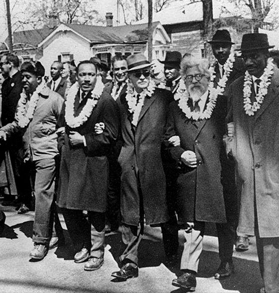 Dr. Martin Luther King, center, is flanked by Rev. Ralph Abernathy, left, Dr. Ralph Bunche, and Rabbi Abraham Joshua Heschel at the 1965 march in Selma, Alabama.