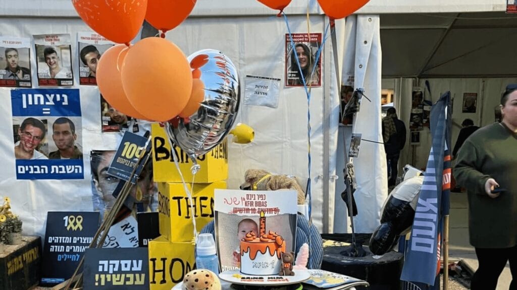 Hostage Square in Tel Aviv, where posters, photographs, signs, and balloons are placed in honor of hostages taken on October 7